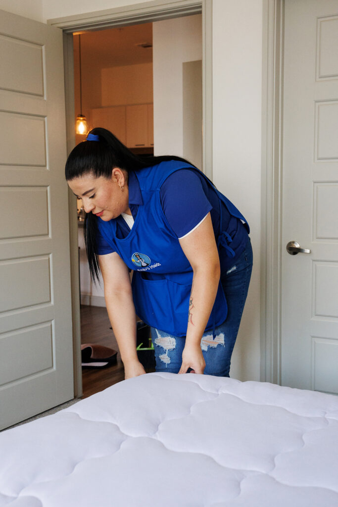 Emily's Maids Cleaner Making Bed